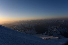 04A Sunrise On Mountains To The East Include Ullukara, Kavkaza, Bzhedukh On The Right From Mount Elbrus Climb.jpg